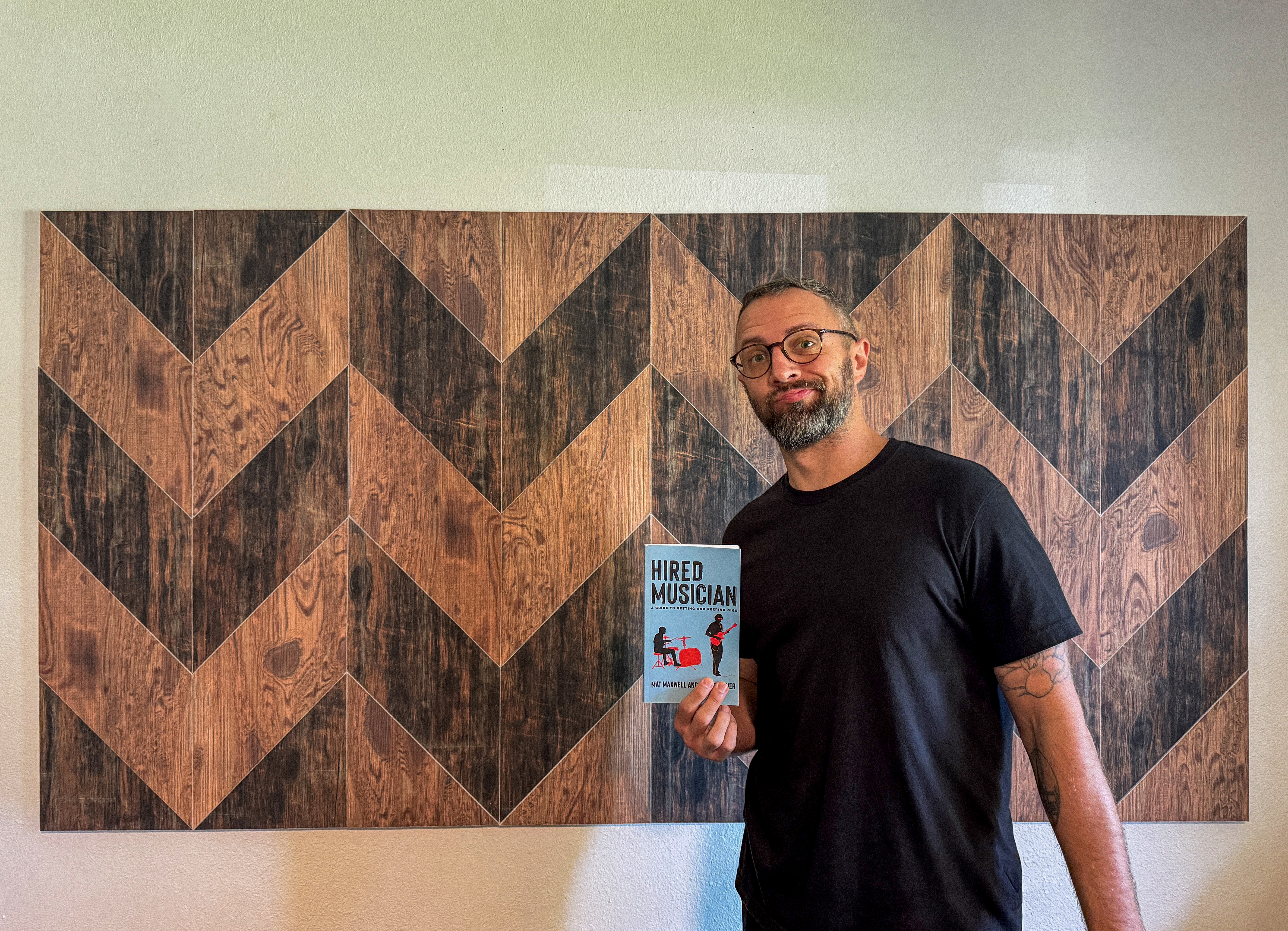 Bass player Mat Maxwell with his Audimute panels